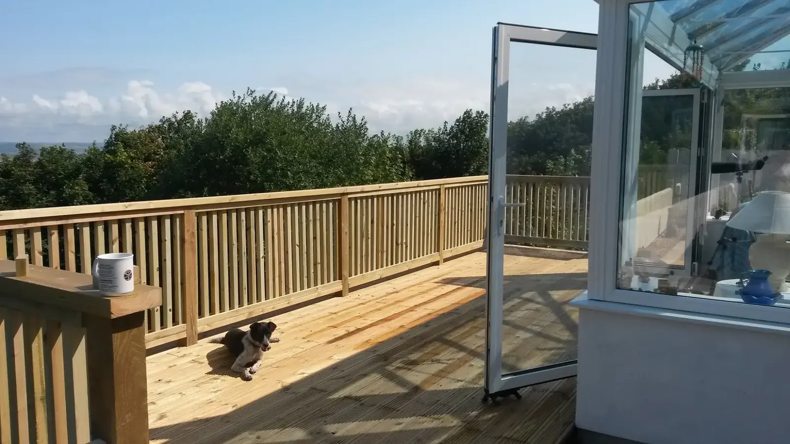 Timber garden decking overlooking the coast