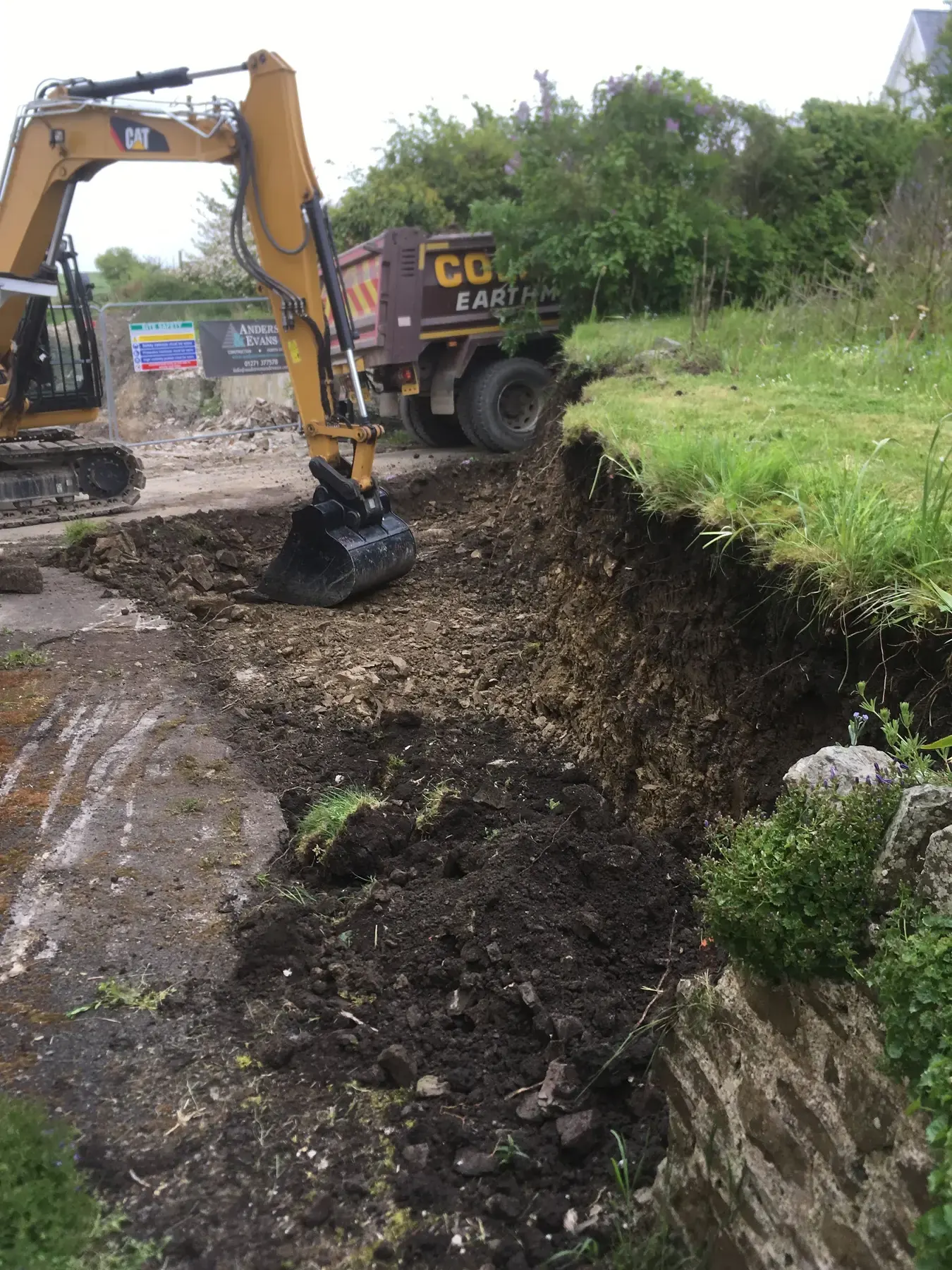 Garden excavation and groundworks before stone paving