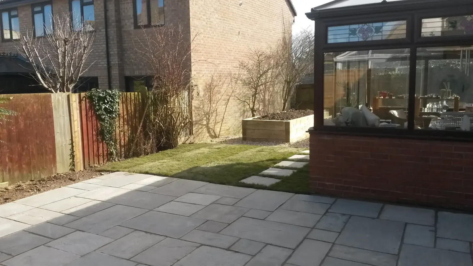 Finished patio and lawn after landscaping work